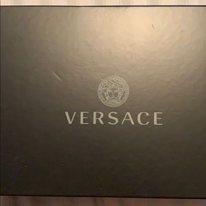 White and gold Versace slides